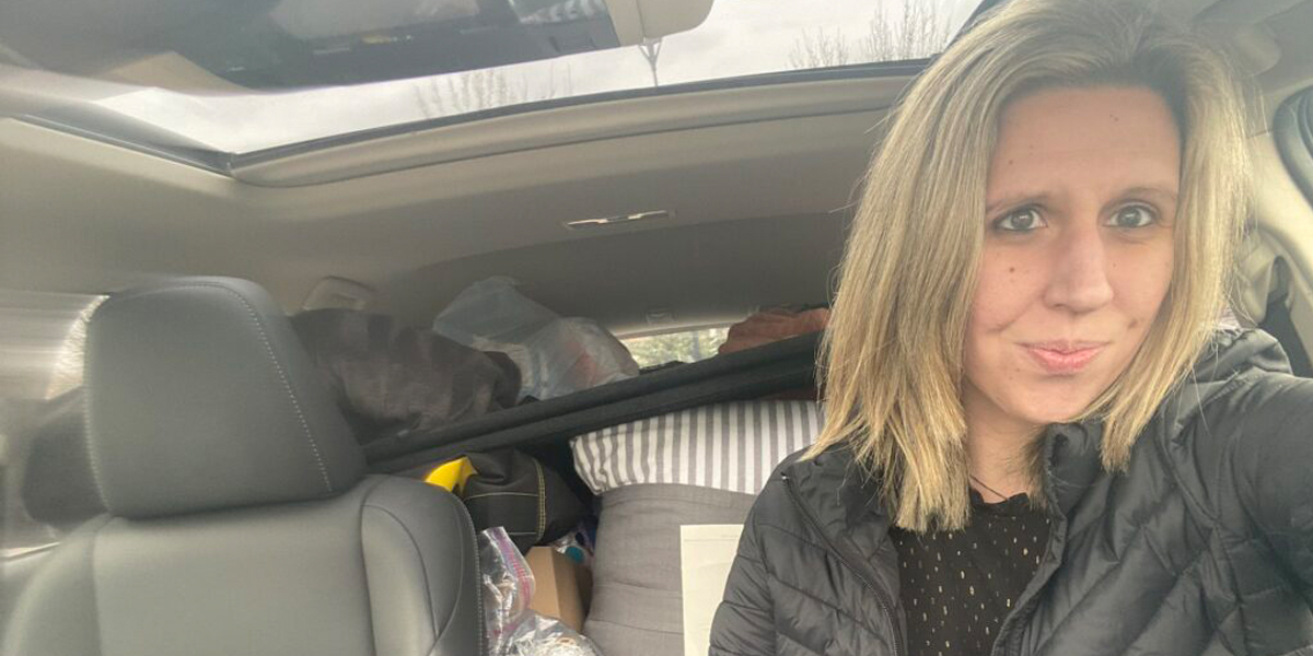 Megan Ciampo in car with belongings